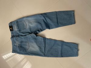 Distressed Blue Denim Jeans