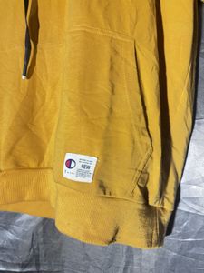 Stylish Yellow Hoodie with Contrasting Sleeves