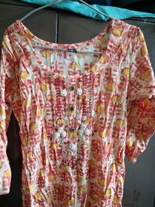 Elegant Printed Kurta with Embellished Neckline