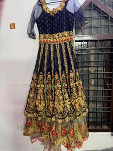 long heavy tail cut dress with intricate embroider