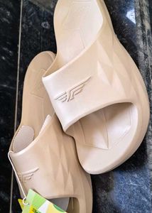 Stylish Beige Flip-Flops by Red Tape..