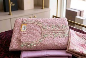 Elegant Pink Embroidered Kurta Set material