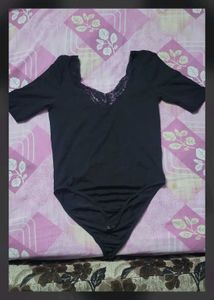 Lace Trimmed Black Bodysuit