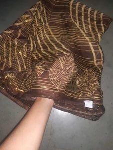 Elegant Brown Saree with Golden Print