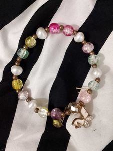 Colorful Beaded Bracelet with Butterfly Charm
