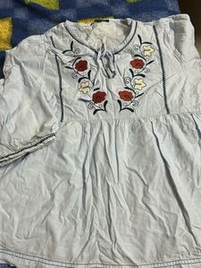 Embroidered Light Blue Peplum Top