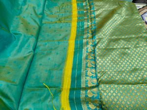 Elegant Yellow Silk Saree with Teal Border