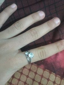 Elegant Solitaire Ring with Accent Stones