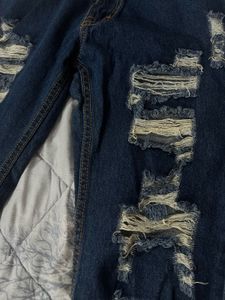 Distressed Blue Denim Jeans