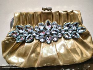 Golden Clutch With Big Diamonds