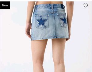 Denim Skirt with Star Embellishments