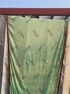 Elegant Light Green Embroidered Saree