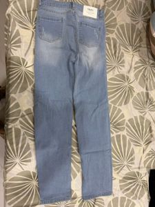 Light Wash Distressed Denim Jeans