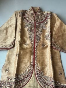 Elegant Gold Sherwani Set with Red Trousers &amp; Dupa