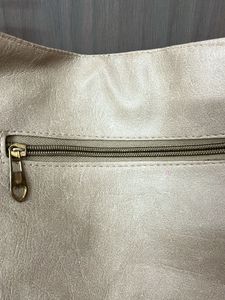 Stylish Beige Hobo Bag with Boho Strap
