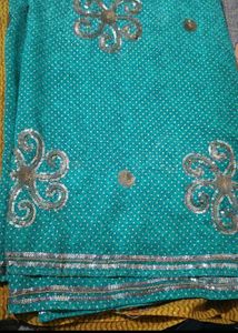 Beautiful Teal Saree with Silver Embellishments