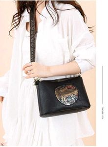 Embossed Elephant Sling Bag