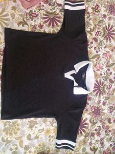 Black Polo Shirt with White Accents