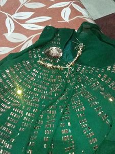 green colour long gown ....  mirror work