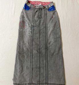 whimsical denim maxi skirt with embellishments