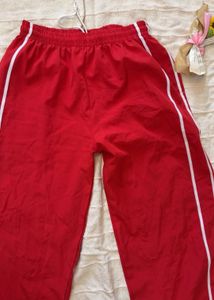 Red Track Pants with White Stripes