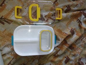 a lunch box in blue and white colour