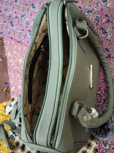 Stylish Light Green Handbag with Charm