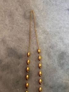 Elegant Gold Oval Bead Necklace