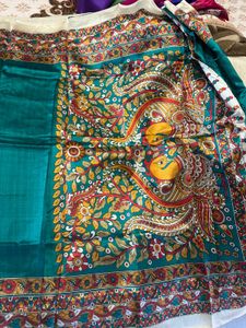 Elegant Teal Saree with Intricate Embroidery