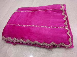 Vibrant Pink Saree with Intricate Embellishments