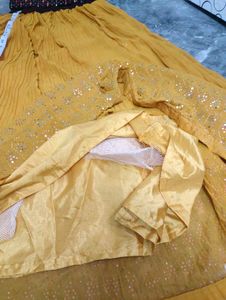 Stunning Yellow Lehenga Choli with Embellished Top