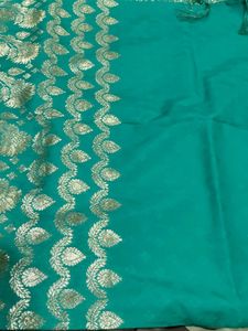 Elegant Teal Saree with Gold Embroidery