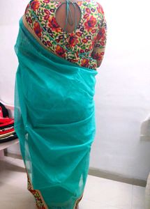 Beautiful Teal Saree with Floral Border