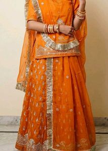 stitched rajputi poshak in orange colour