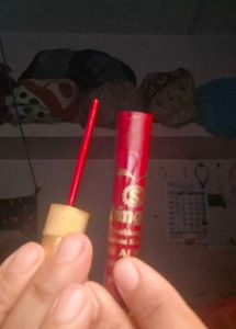 it is maroon and deep red shringar bindi stick