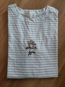 stripped off white top with thread embroidery