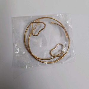 Gold Hoop Earrings with Heart Detail