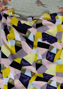 Vibrant Geometric Print Ruffle Top