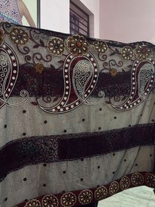 Elegant Saree with Intricate Patterns