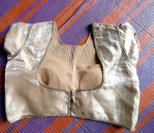 Elegant Gold + cream colour Embroidered Blouse