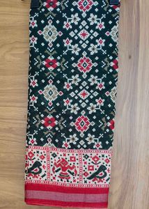 Elegant Dark Saree with Traditional Print