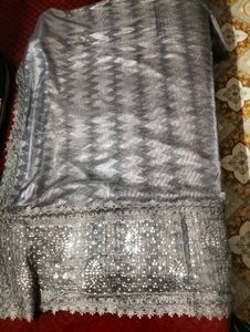 Elegant Silver Saree with Intricate Embellishments