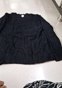 Black shiny woolen top