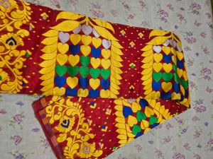 Vibrant Red Saree with Floral Motifs