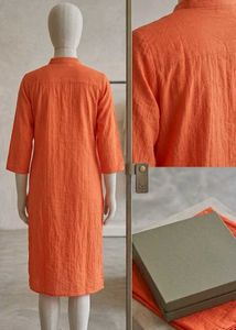 Vibrant Orange Kurta with Peacock Embroidery