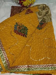 Embellished Brown Net Saree with blouse
