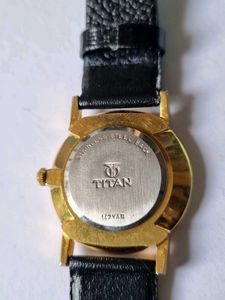 Titan Analog unisex Watch with gold plated