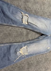 Distressed Blue Denim Jeans