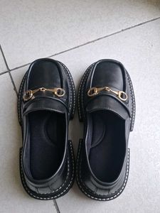 Chic Black Loafers with Gold Buckle