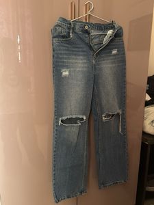 Distressed Blue Denim Jeans
